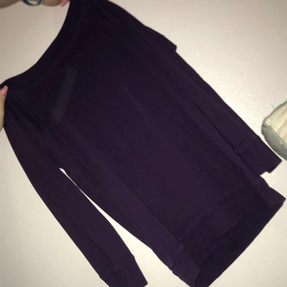 Purple sweatshirt.